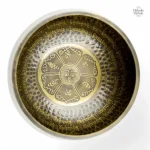 Bol chantant tibétain avec inscriptions sacrées en sanskrit