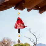 Cloche ornée d'un oiseau, idéale pour l'extérieur