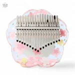Kalimba décoré de motifs floraux rose