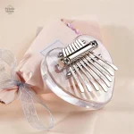 Kalimba transparent léger avec 8 lames vibrantes pour mélodies