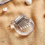 Kalimba portable, design transparent, parfait pour les musiciens débutants